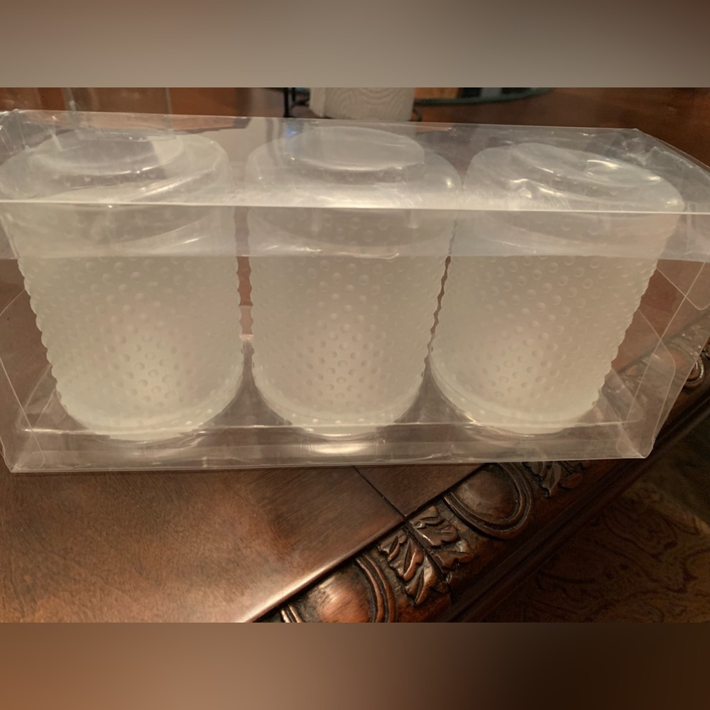 2 boxes of brand new candle holders